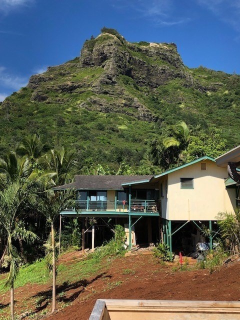 5309 Kihei Road Kapaa, HI 96746 - Photo 20 of 20 a view of a large building with a mountain view