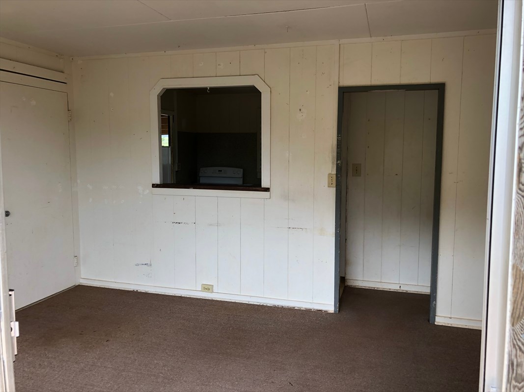 5309 Kihei Road Kapaa, HI 96746 - Photo 5 of 20 a view of a livingroom with an empty space and a window