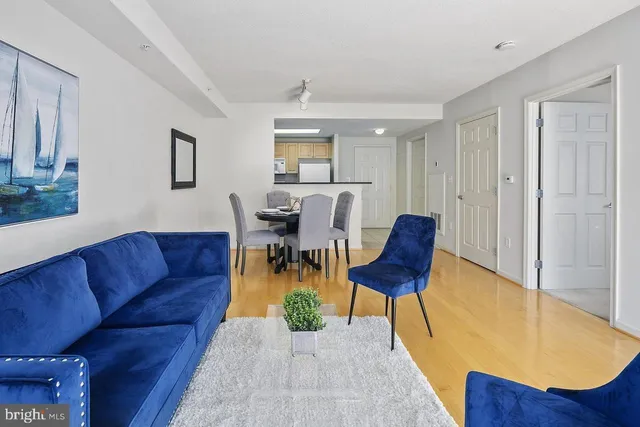 a view of a livingroom with furniture and wooden floor