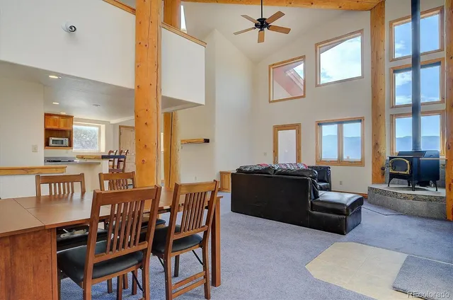 a kitchen with stainless steel appliances granite countertop a sink and a stove