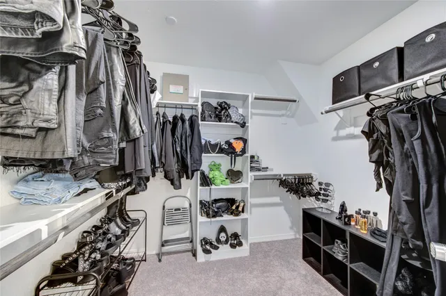 a bathroom with a double vanity sink a mirror and shower