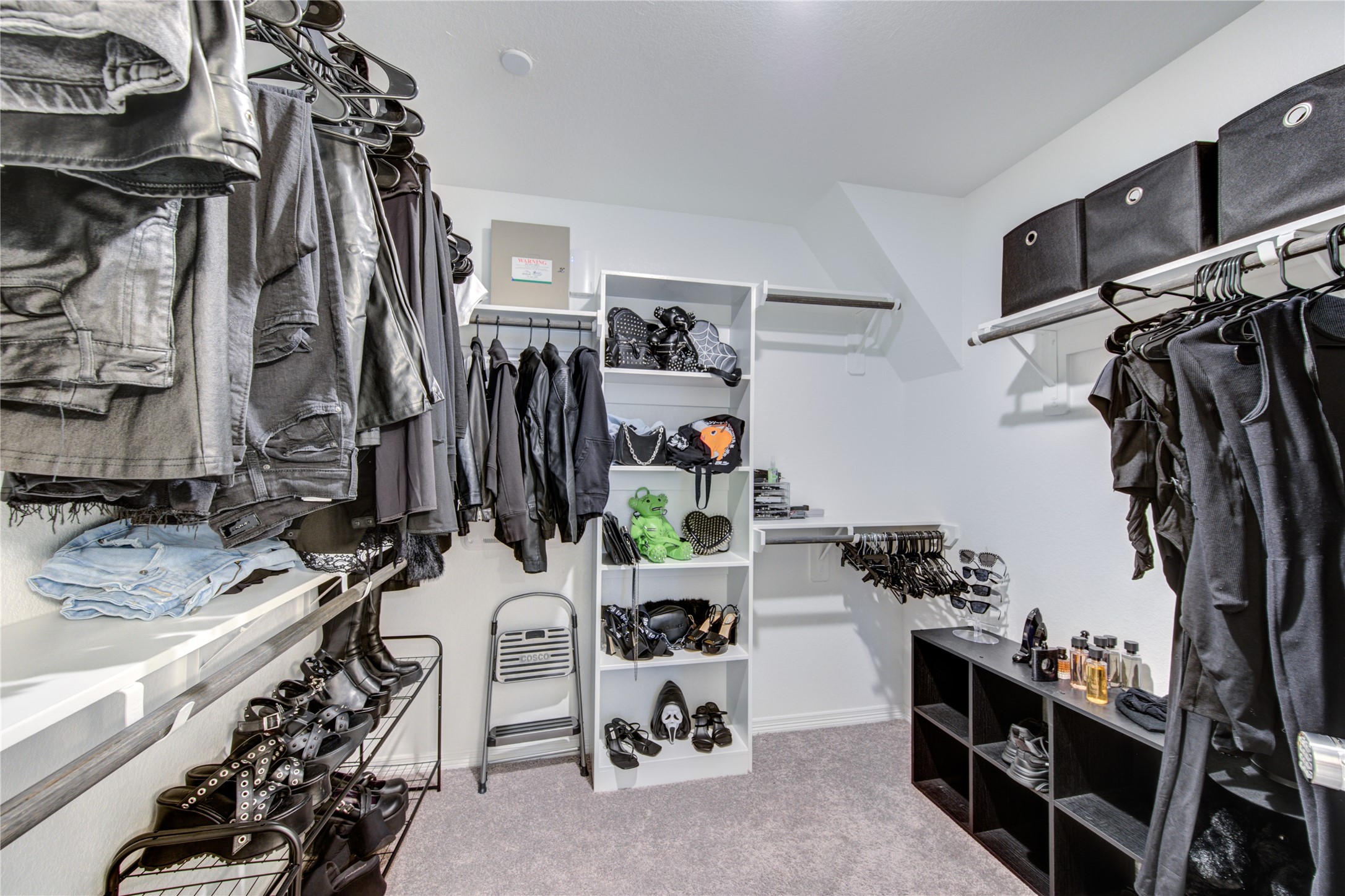 8030 Scanlan Trace Missouri City, TX 77459 - Photo 11 of 17 a view of walk in closet with clothes and shoes
