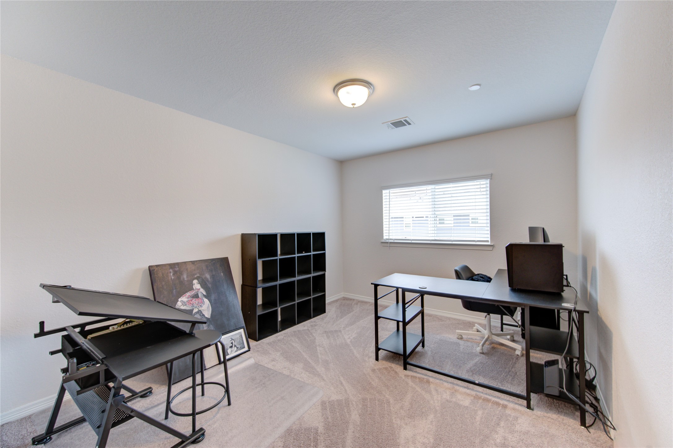 8030 Scanlan Trace Missouri City, TX 77459 - Photo 15 of 17 a workspace with furniture and a window