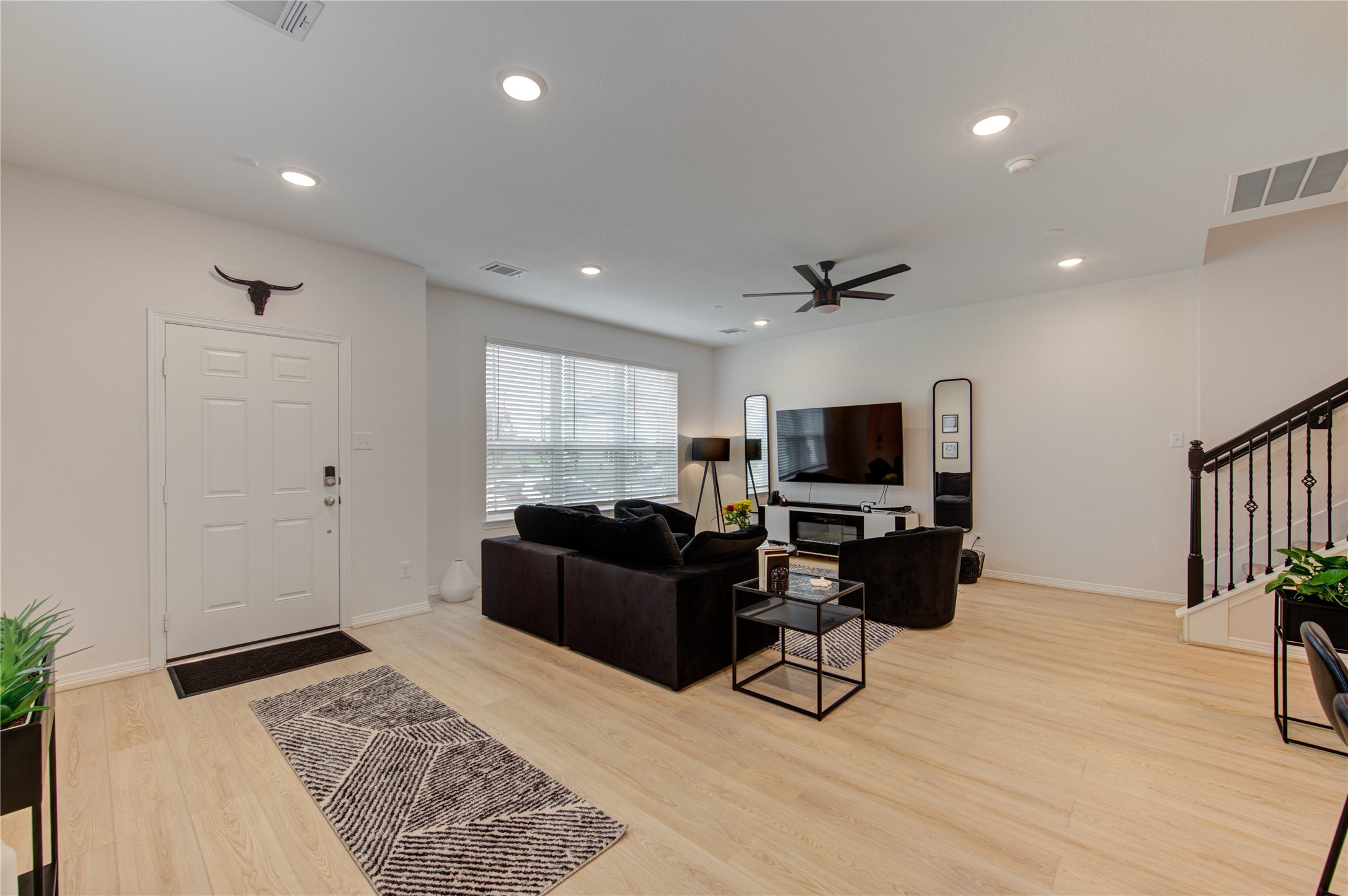 8030 Scanlan Trace Missouri City, TX 77459 - Photo 5 of 17 a living room with furniture and a flat screen tv