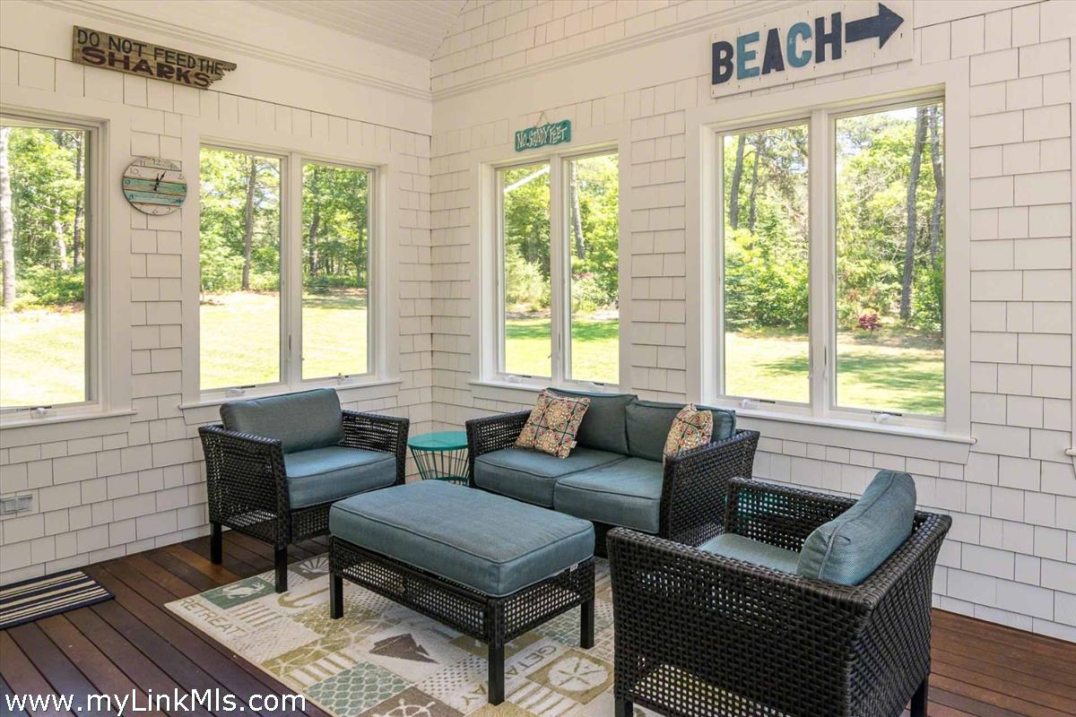 10 Codman Spring Road Edgartown, MA 02539 - Photo 11 of 30 a living room with furniture and a window