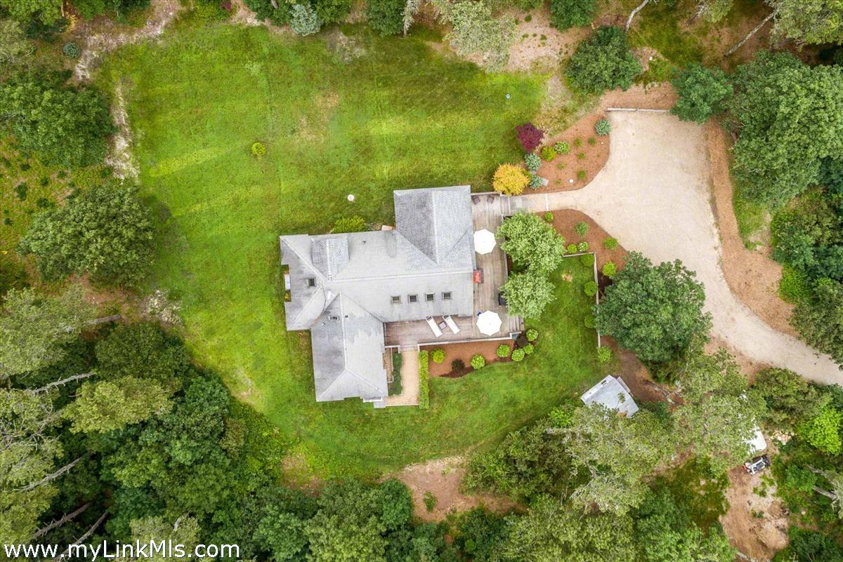 10 Codman Spring Road Edgartown, MA 02539 - Photo 30 of 30 an aerial view of a house with a yard basket ball court and outdoor seating