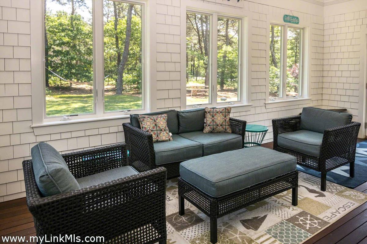 10 Codman Spring Road Edgartown, MA 02539 - Photo 10 of 30 a living room with furniture and a window