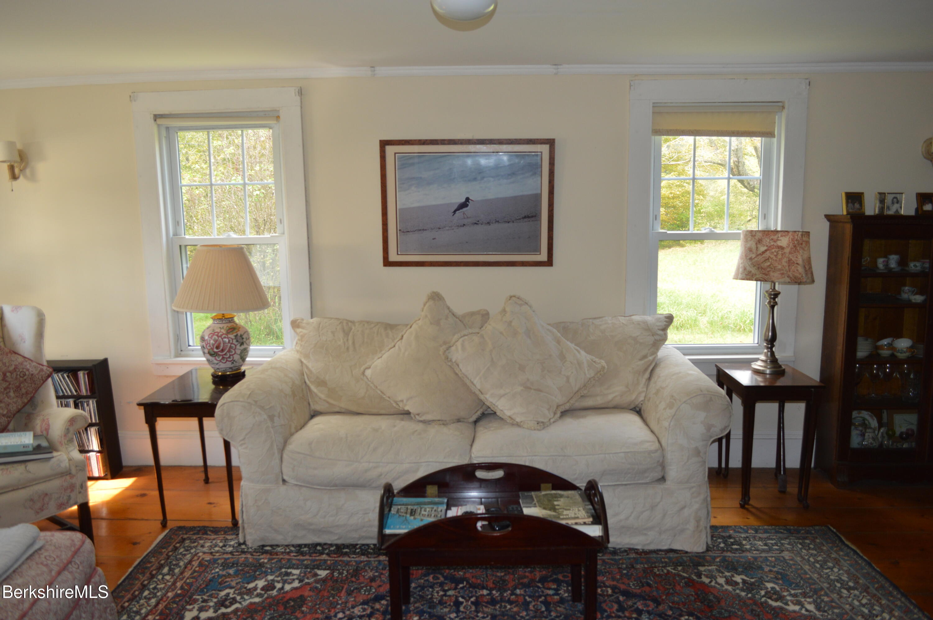 234 County Road Becket, MA 01223 - Photo 13 of 67 a living room with furniture a table and a window