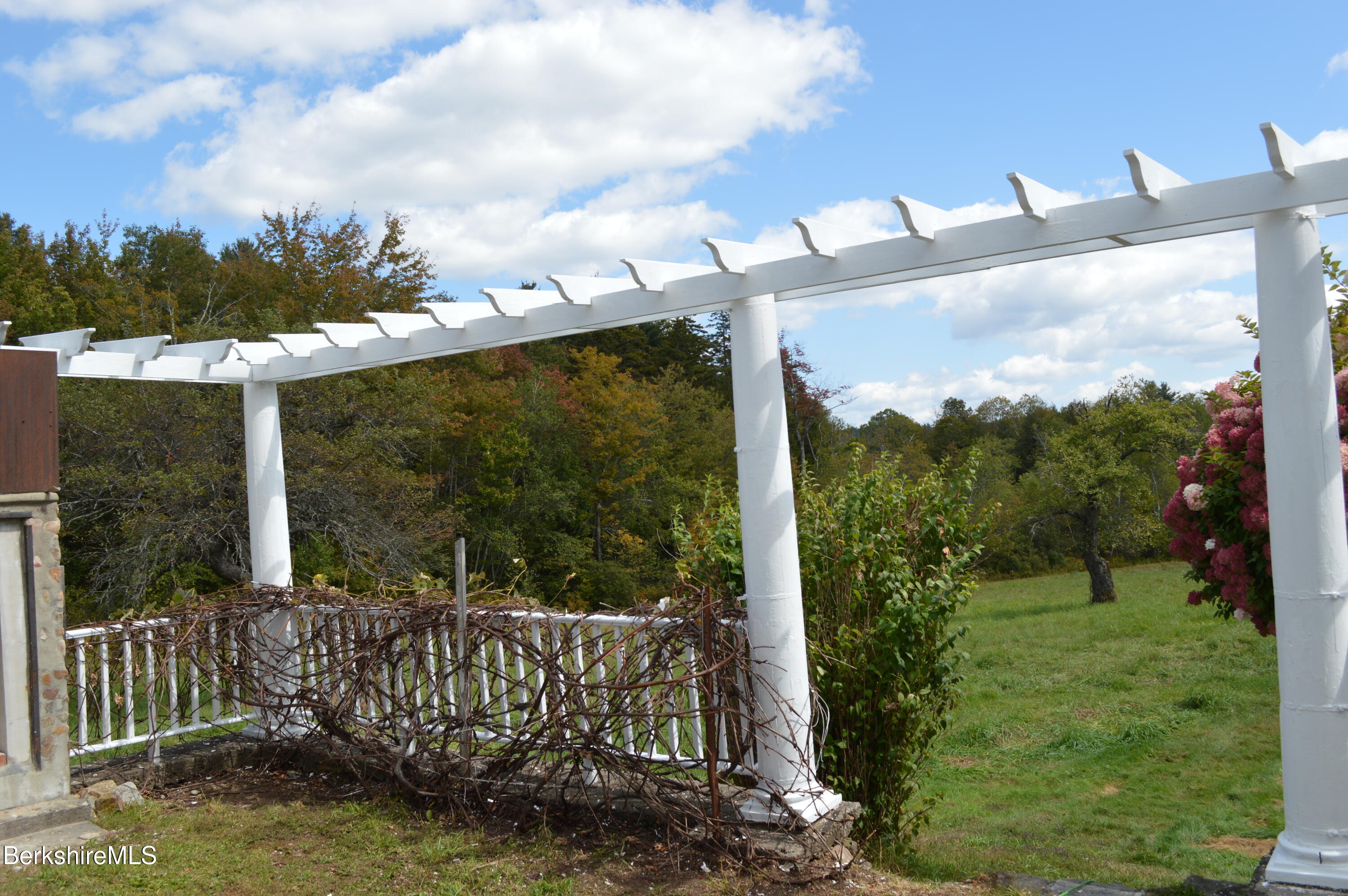 234 County Road Becket, MA 01223 - Photo 23 of 67 a view of a garden from a balcony