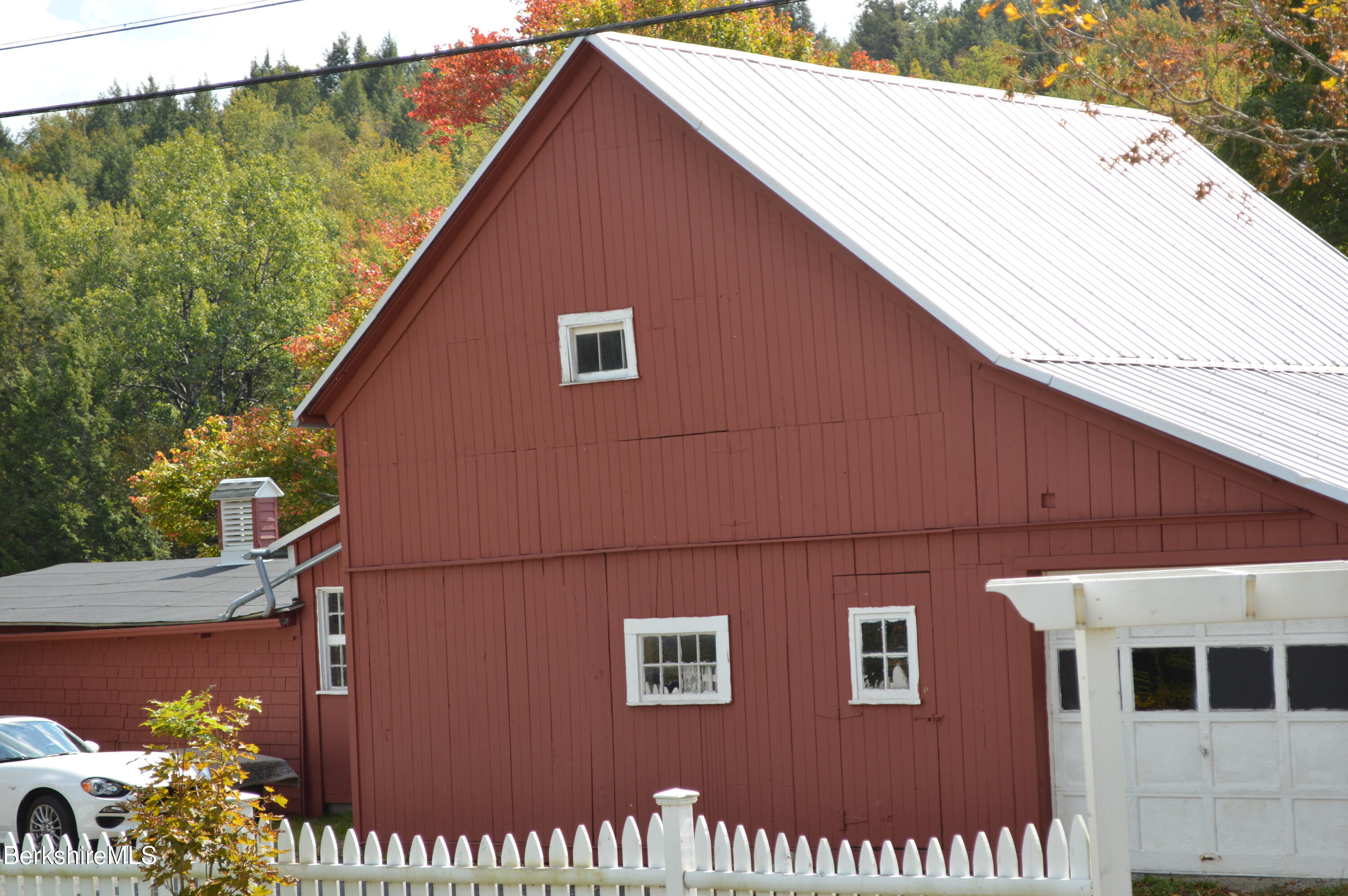 234 County Road Becket, MA 01223 - Photo 9 of 67 a view of a house with a balcony
