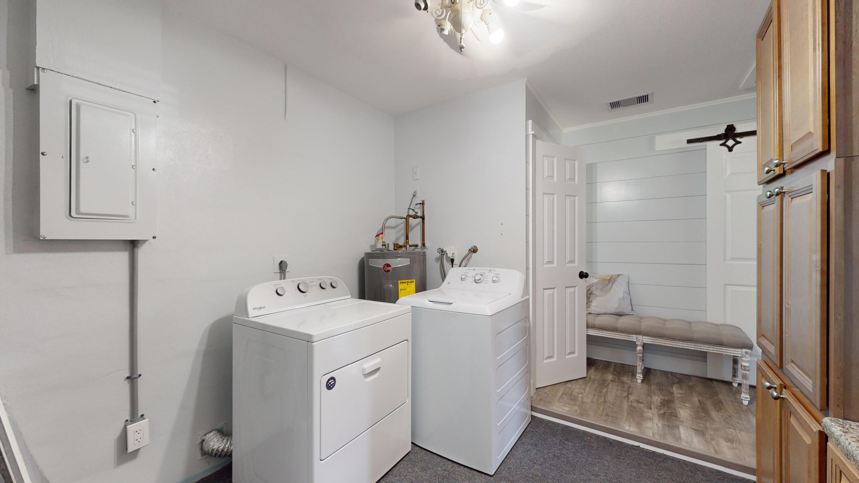7606 Donlon Road Fort Pierce, FL 34951 - Photo 27 of 54 a utility room with dryer and washer
