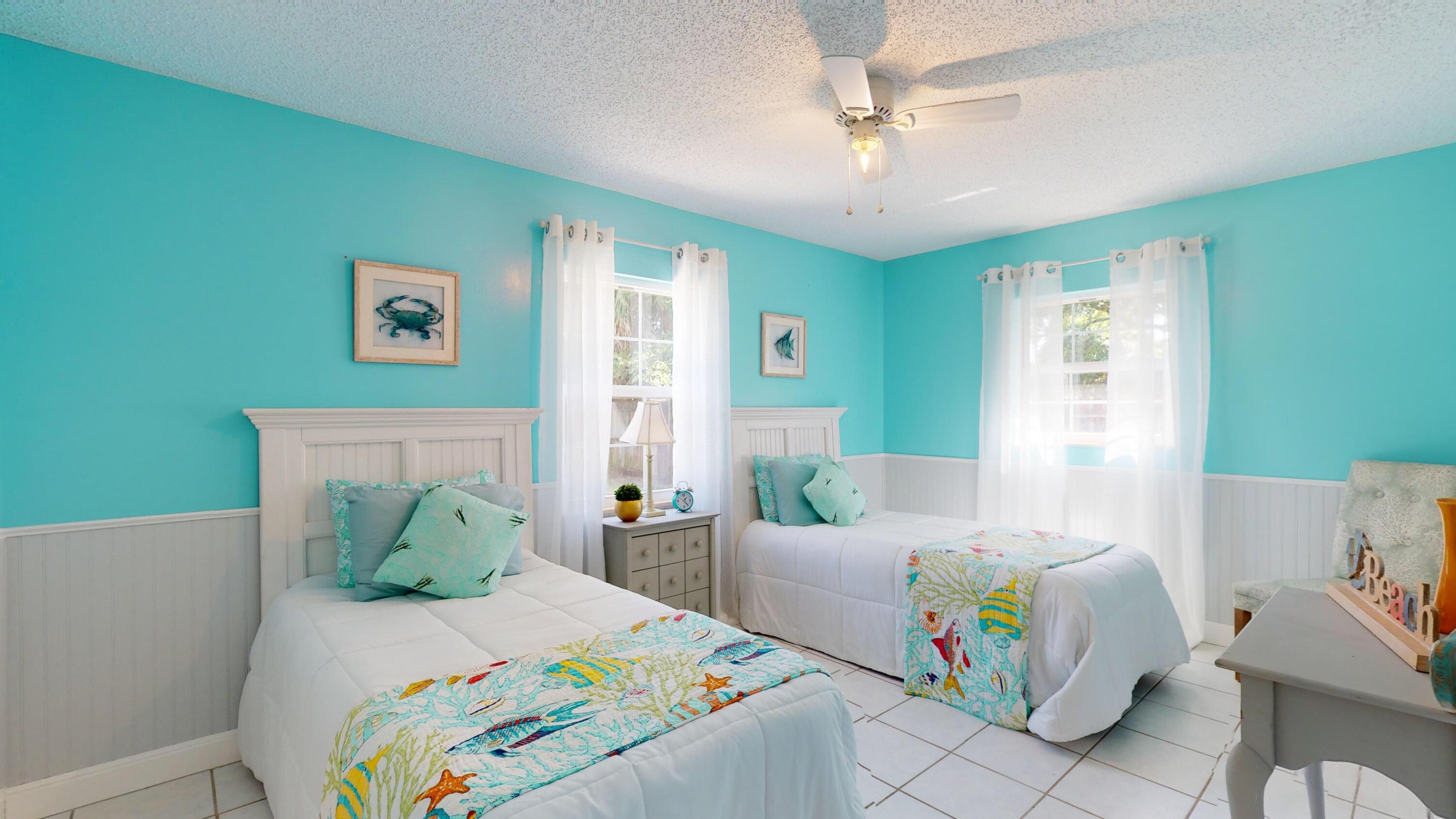 7606 Donlon Road Fort Pierce, FL 34951 - Photo 32 of 54 a bedroom with a bed and a couch