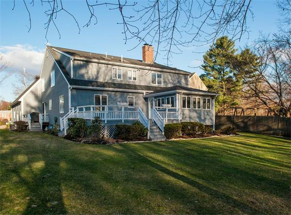 20 William Street Needham, MA 02494 - Photo 5 of 16 a front view of a house with a yard