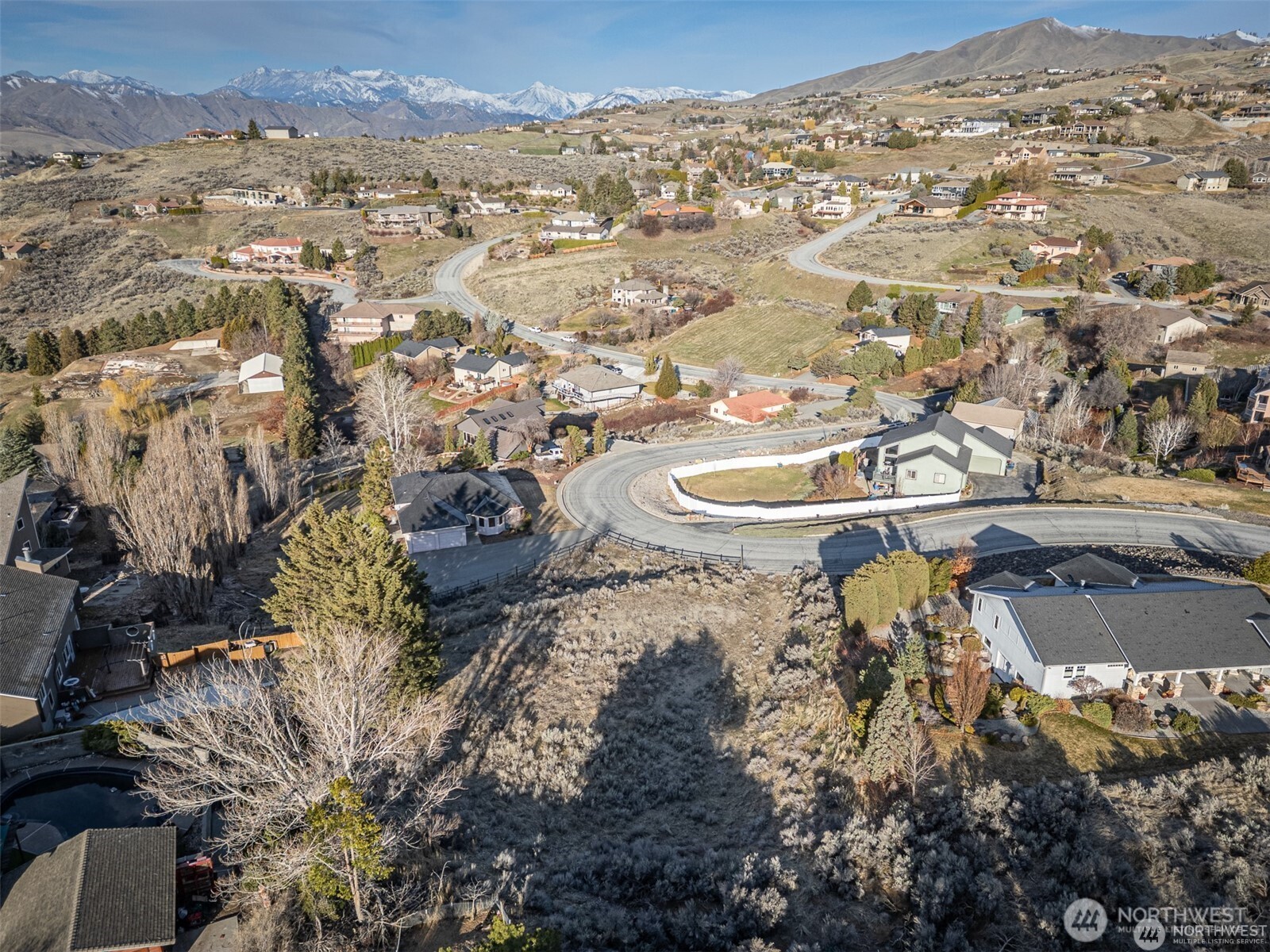 155 Stoney Brook Lane Wenatchee, WA 98801 - Photo 11 of 16 an aerial view of residential houses with outdoor space