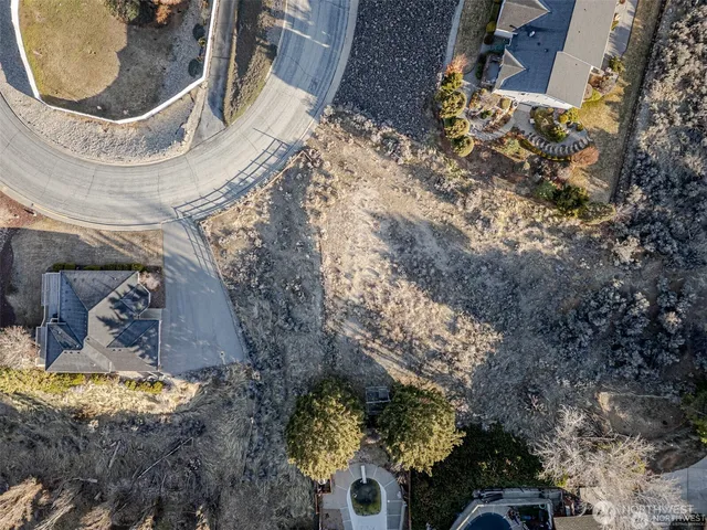 an aerial view of a house with a outdoor space