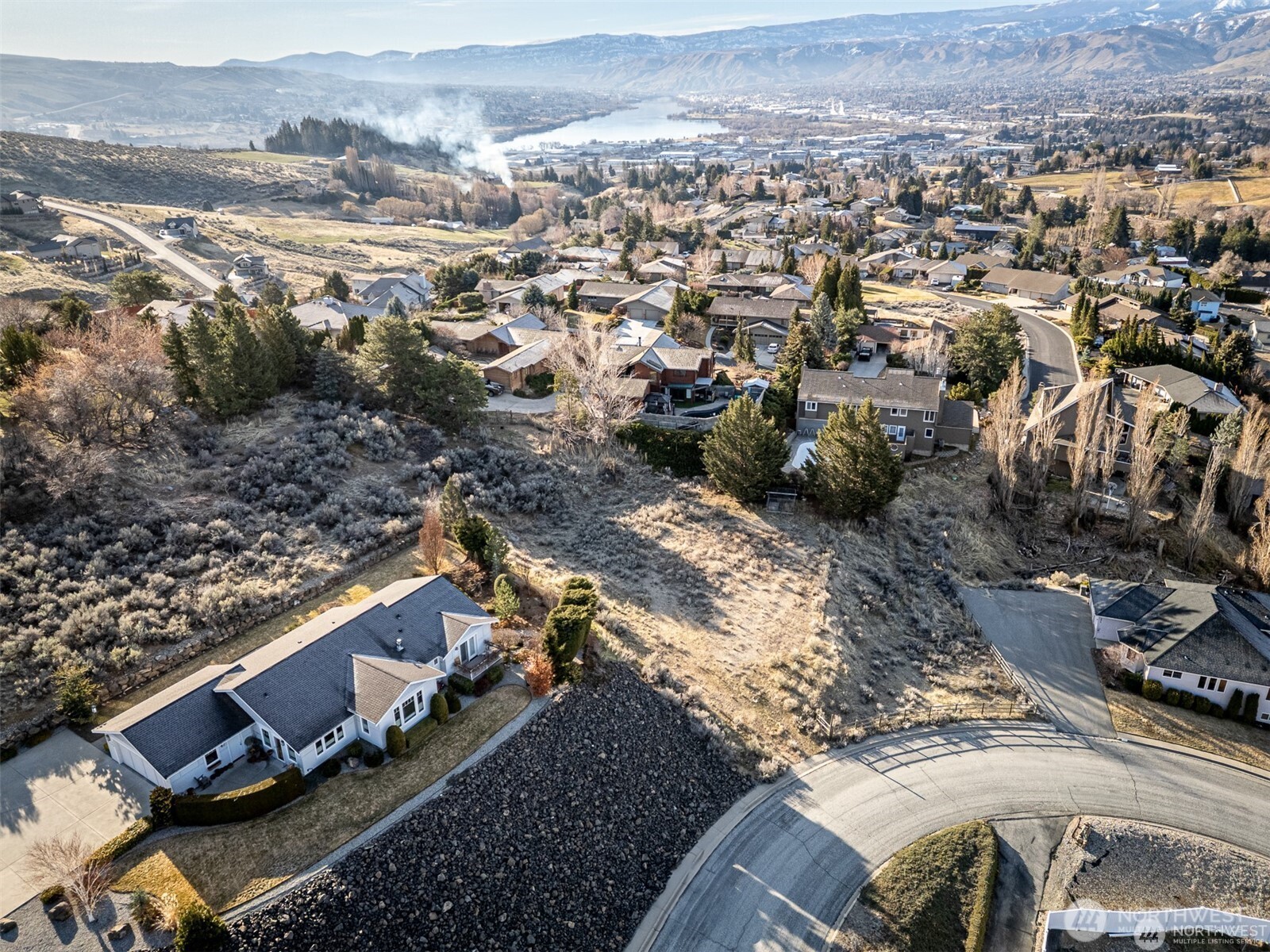 155 Stoney Brook Lane Wenatchee, WA 98801 - Photo 8 of 16 an aerial view of a house with a yard