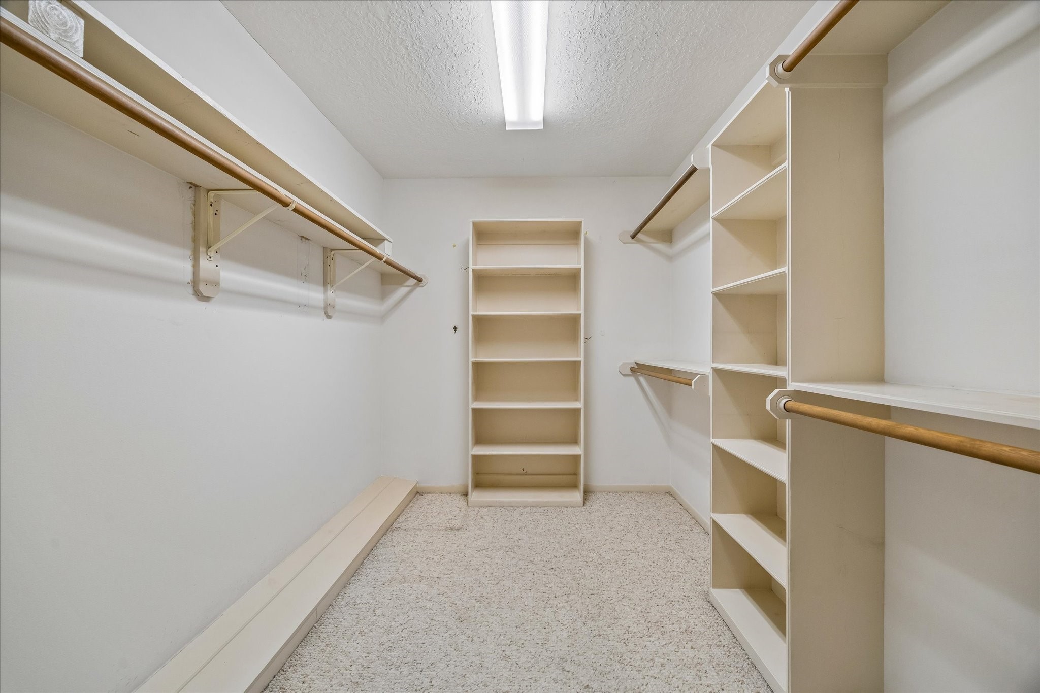 5515 Sylmar Road Houston, TX 77081 - Photo 16 of 28 One of two walk-in closets in the primary bedroom (East side)