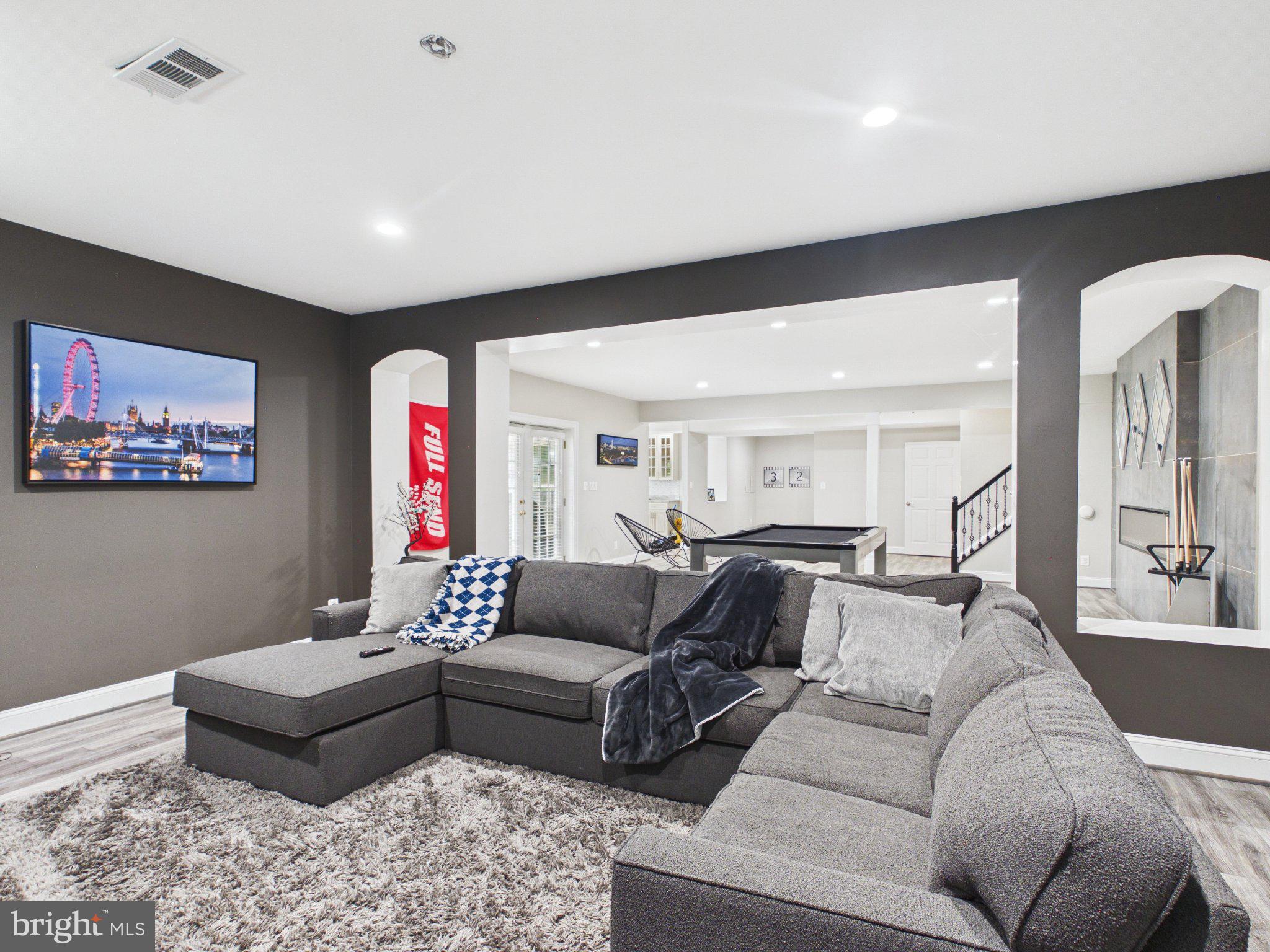 38565 Piggott Bottom Road Hamilton, VA 20158 - Photo 56 of 85 a living room with furniture and a flat screen tv