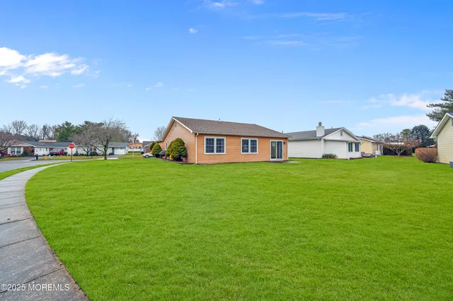 a house view with a garden space