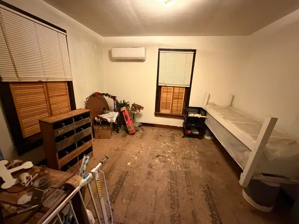 a room with furniture and a window