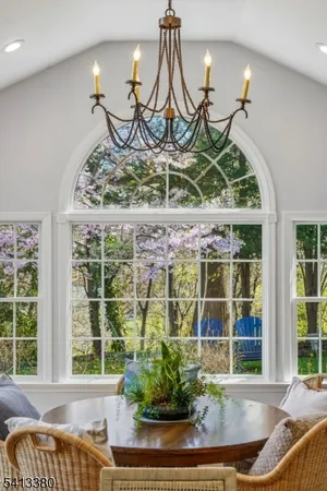 a front view of a house with a garden and porch