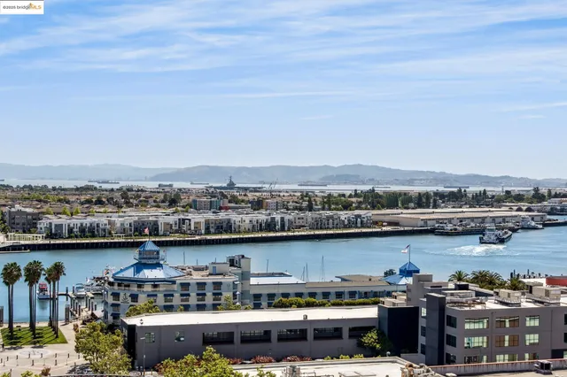 a view of a city with tall buildings