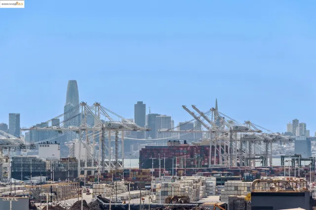 a dining room with stainless steel appliances kitchen island granite countertop a dining table chairs and view kitchen