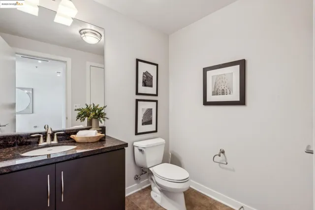 a living room with furniture and large windows