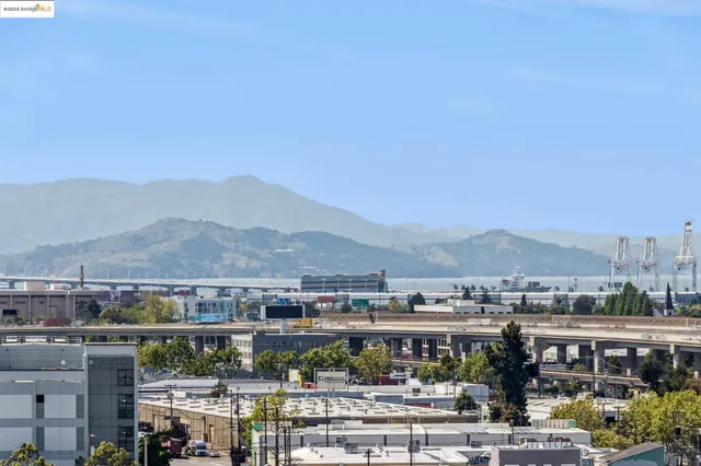 a bedroom with a bed and a television