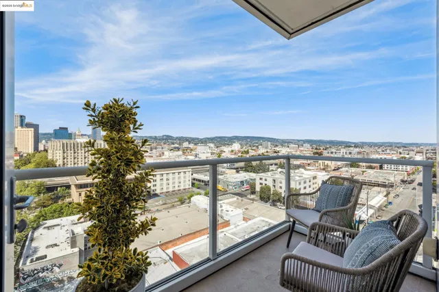 a spacious bathroom with a toilet a sink and mirror
