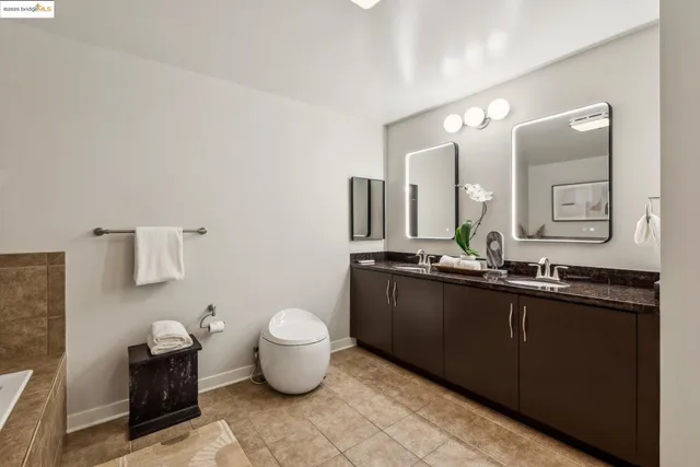 an aerial view of a house with outdoor space and street view