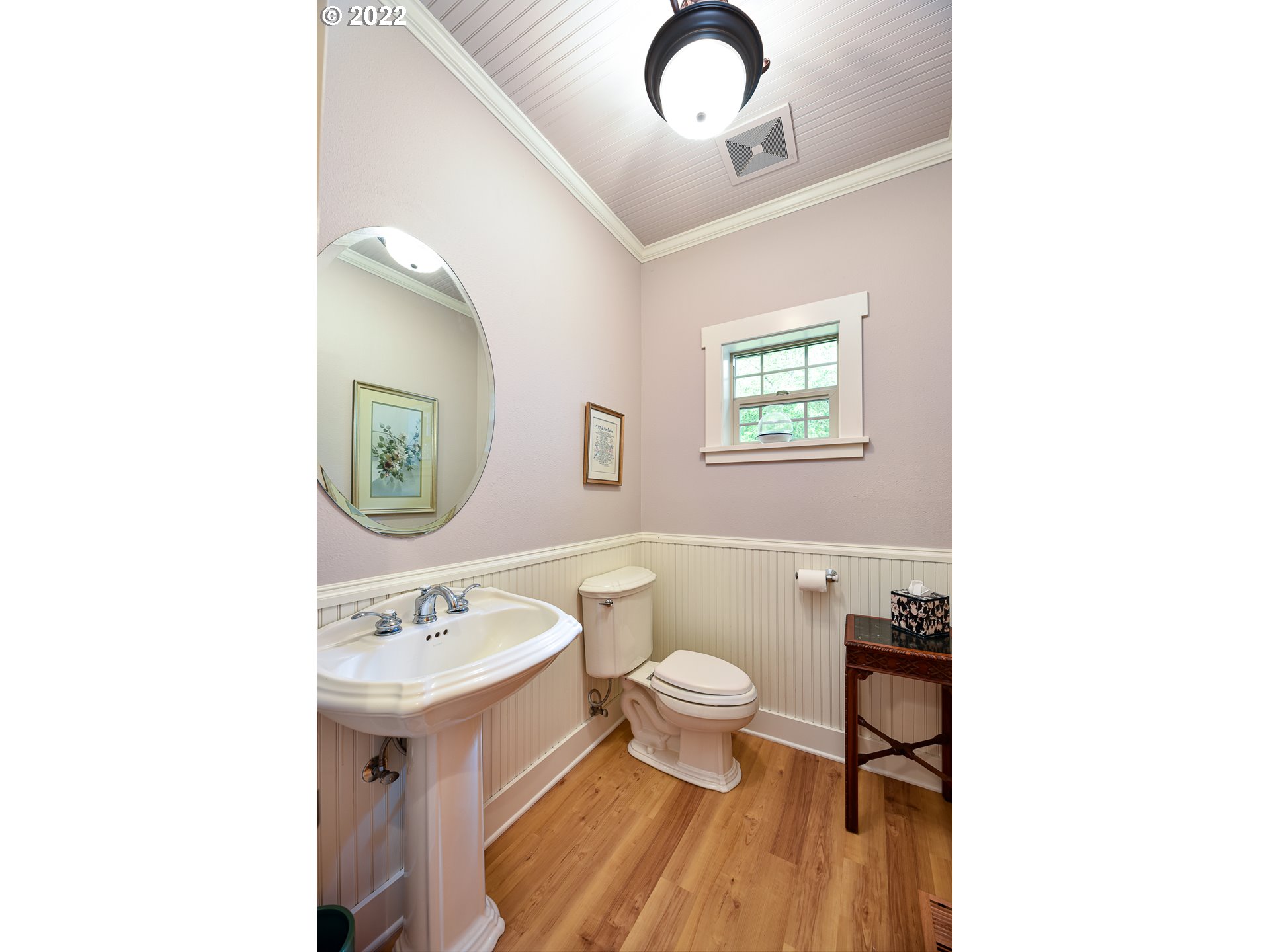 90730 Marcola Road Springfield, OR 97478 - Photo 22 of 30 a bathroom with a sink toilet a mirror and vanity