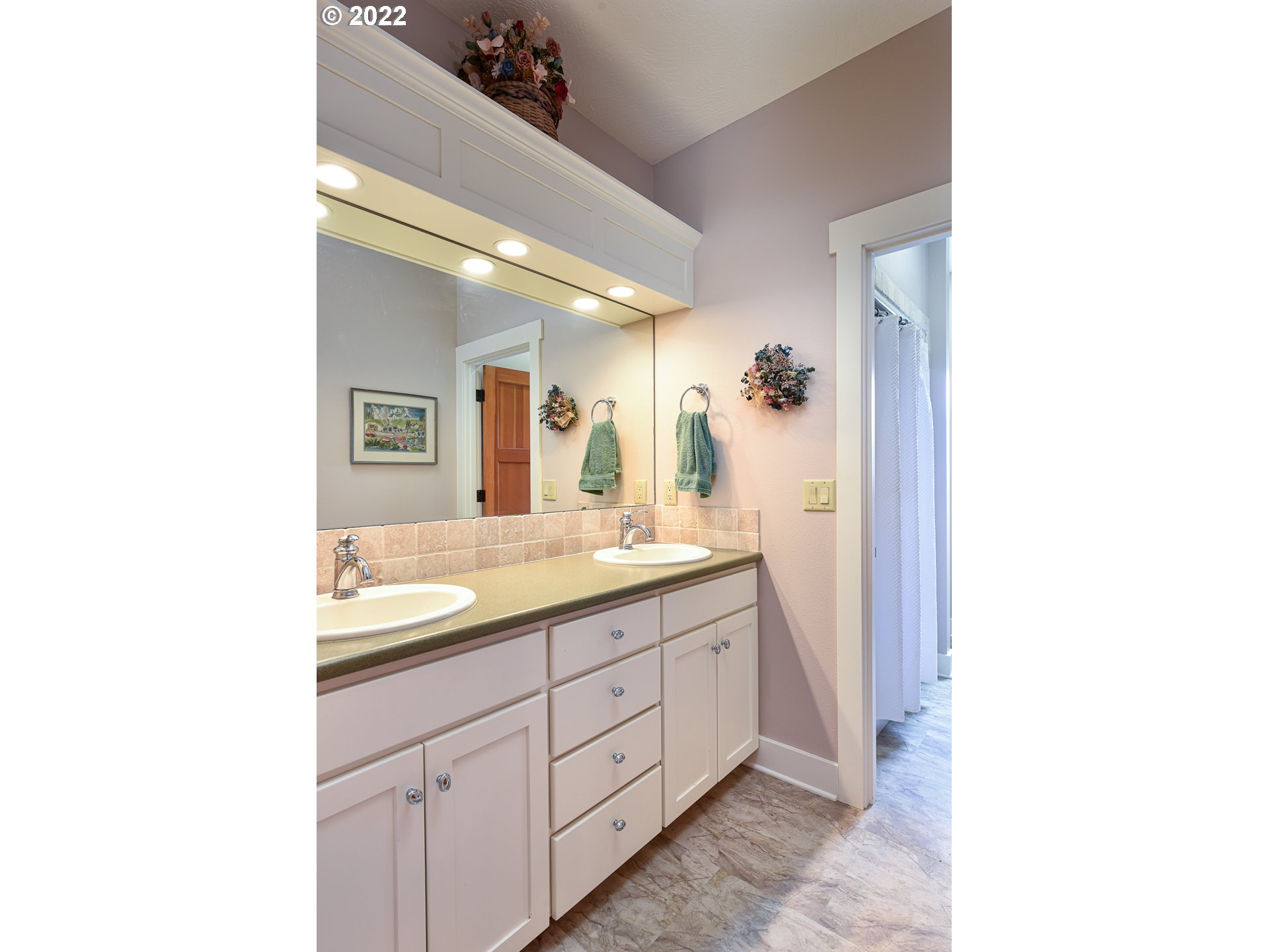 90730 Marcola Road Springfield, OR 97478 - Photo 23 of 30 a spacious bathroom with a granite countertop sink a mirror and a shower