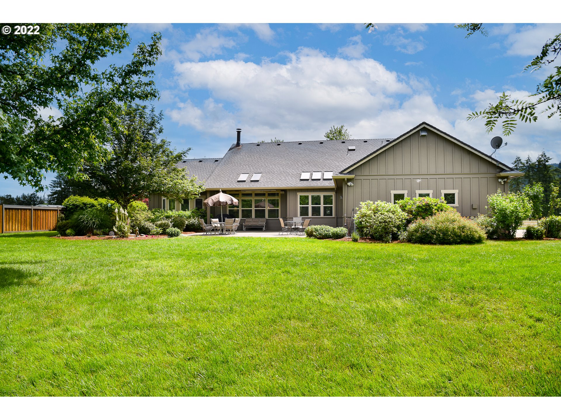 90730 Marcola Road Springfield, OR 97478 - Photo 26 of 30 a front view of a house with garden
