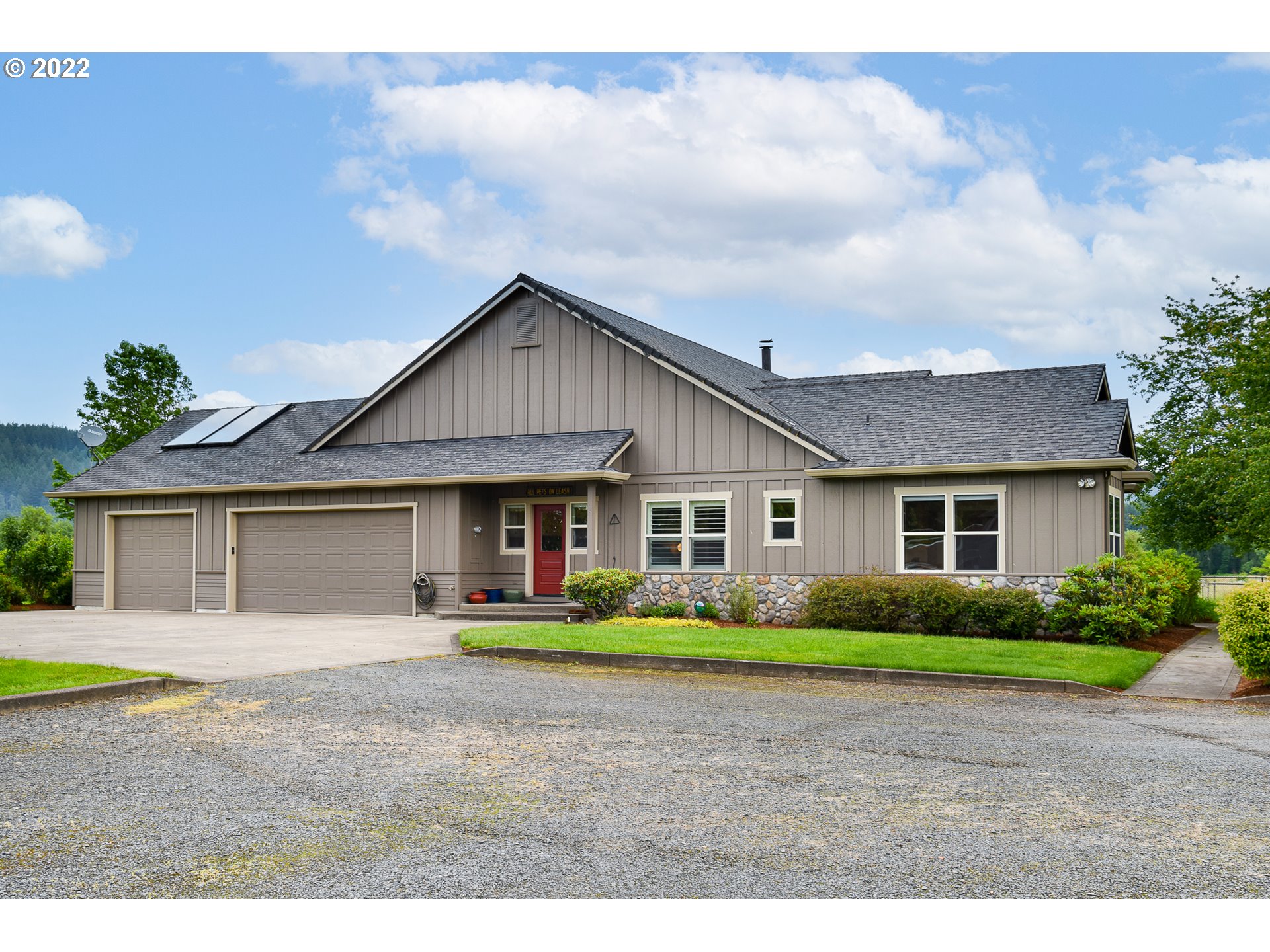 90730 Marcola Road Springfield, OR 97478 - Photo 27 of 30 a front view of house with yard and green space