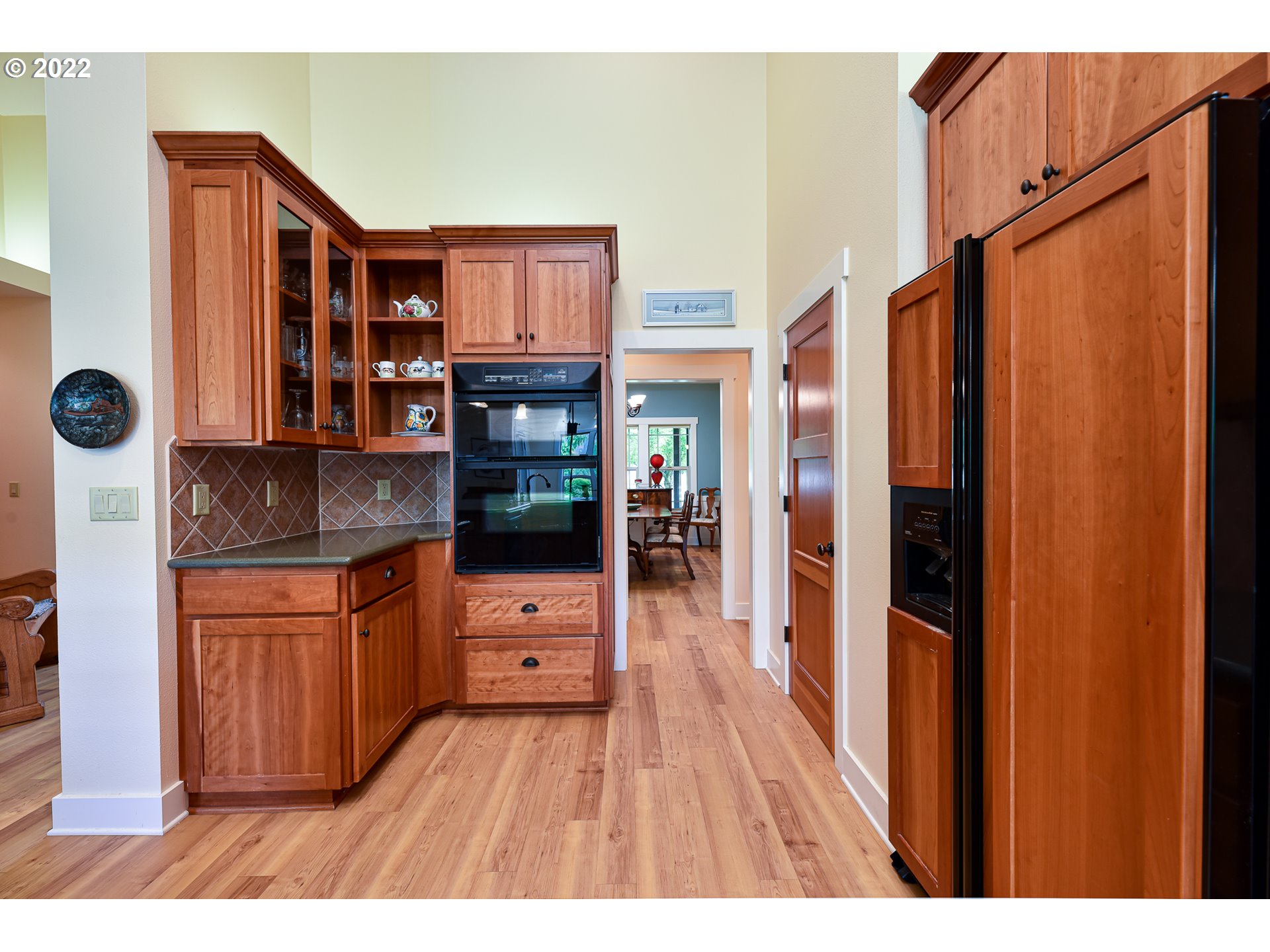 90730 Marcola Road Springfield, OR 97478 - Photo 9 of 30 a open kitchen with stainless steel appliances granite countertop a refrigerator and a wooden cabinets