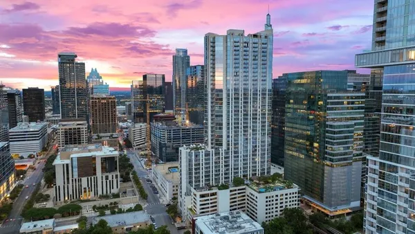 a city view with tall buildings