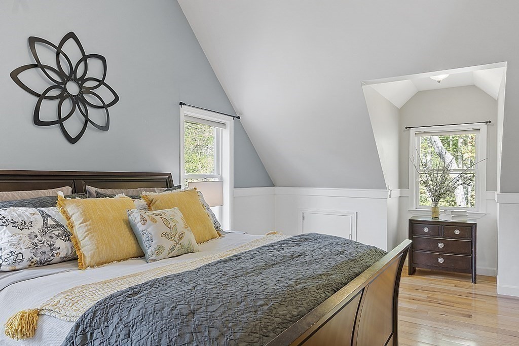 264 Hackett Hill Road Hooksett, NH 03106 - Photo 21 of 41 a bedroom with a bed and a window