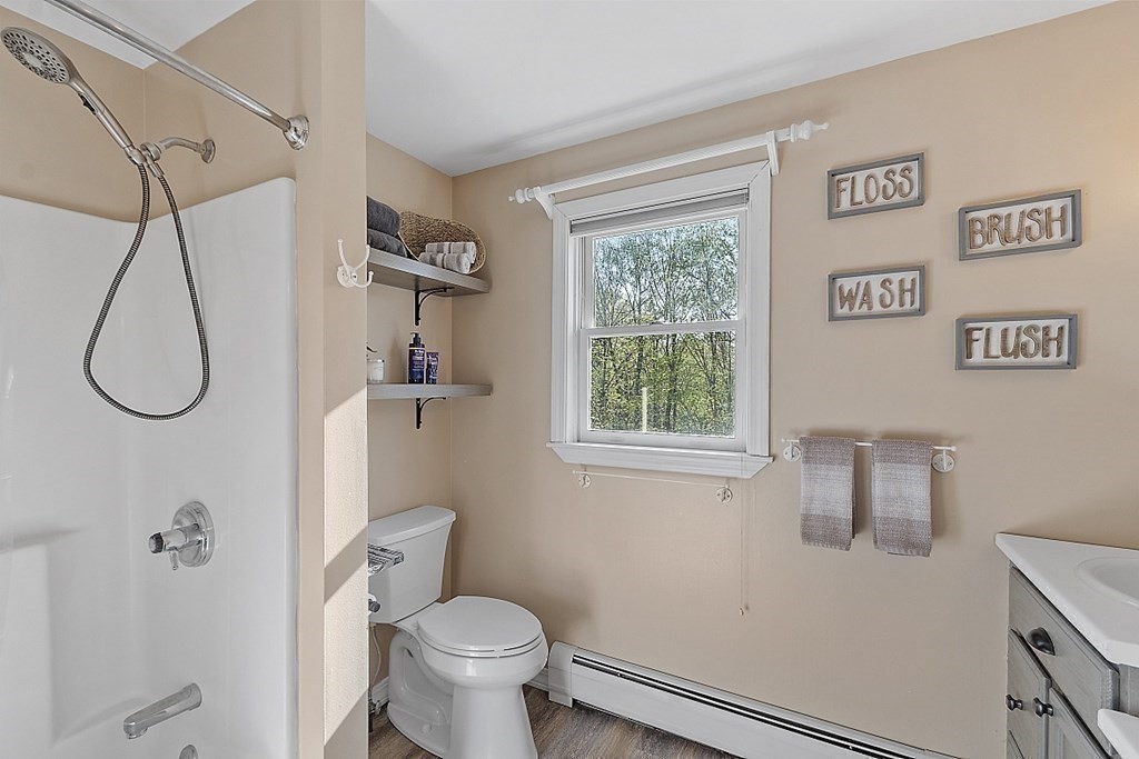 264 Hackett Hill Road Hooksett, NH 03106 - Photo 23 of 41 a bathroom with a toilet and a shower