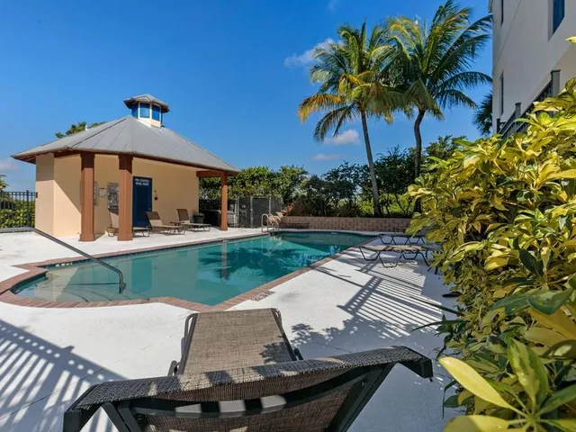a view of a yard with furniture