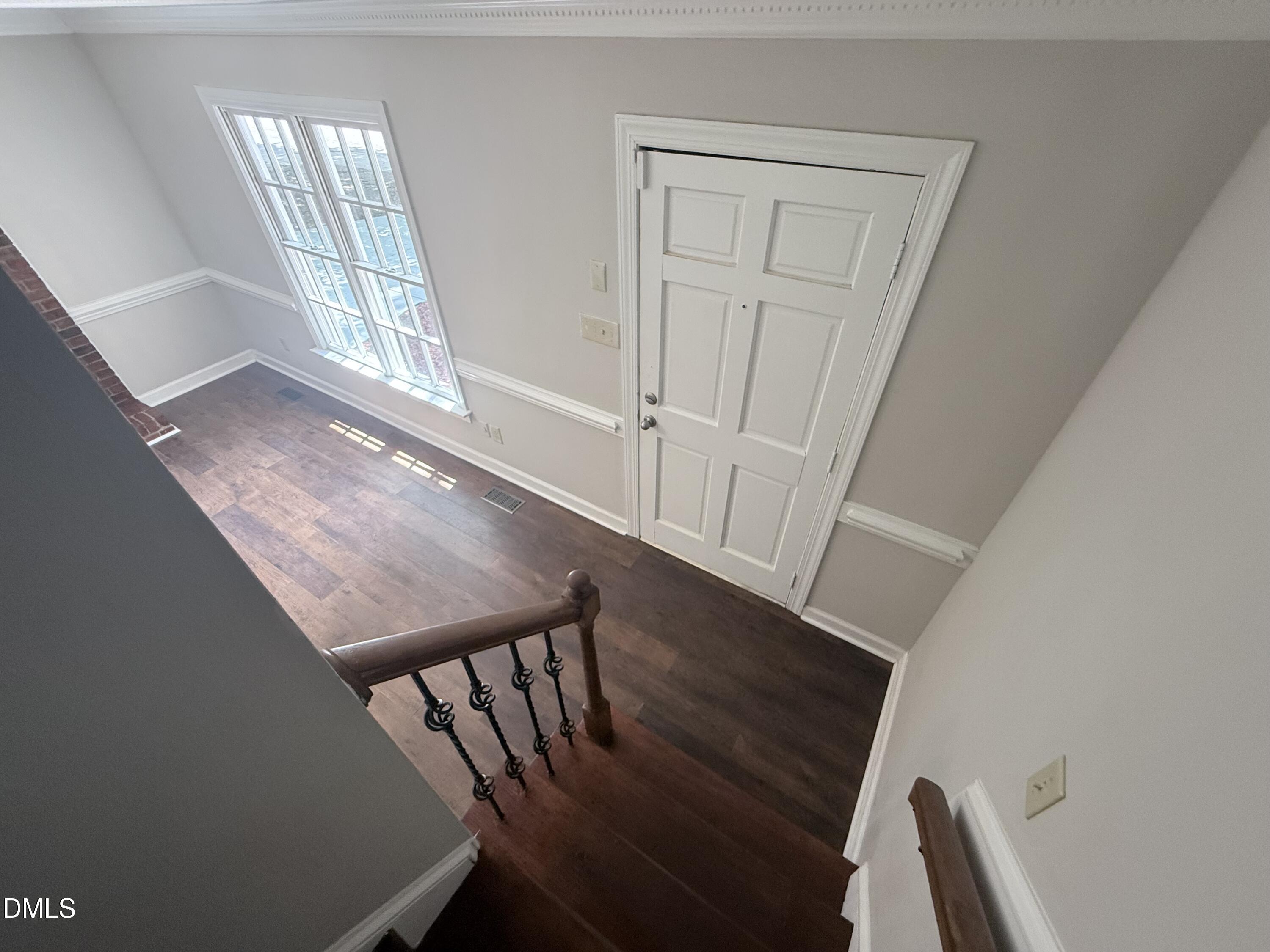 2900 Broadlands Drive Raleigh, NC 27604 - Photo 56 of 60 a view of entryway with stairs and wooden floor