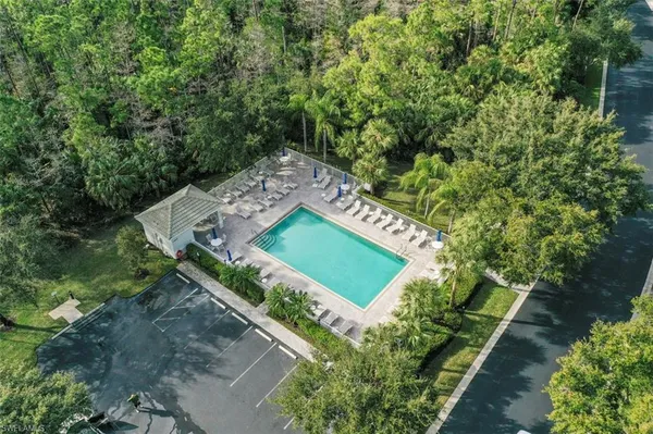 a view of a swimming pool with a patio