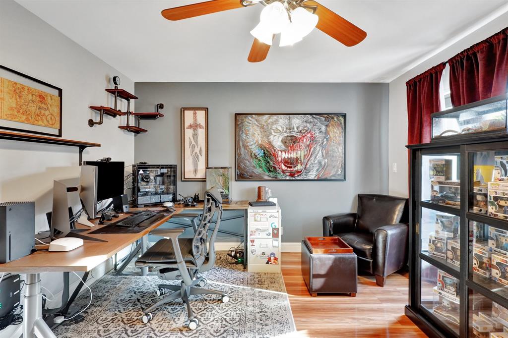 6810 Allegre Court Boca Raton, FL 33433 - Photo 28 of 29 a work room with furniture and a flat screen tv