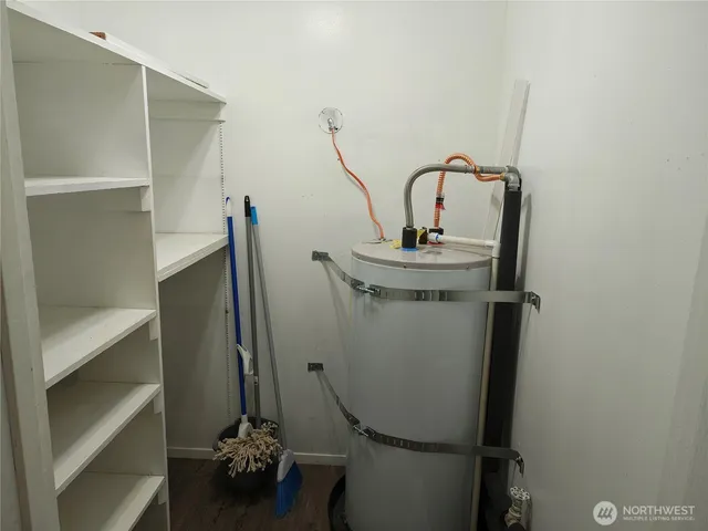 a bathroom with a sink and mirror
