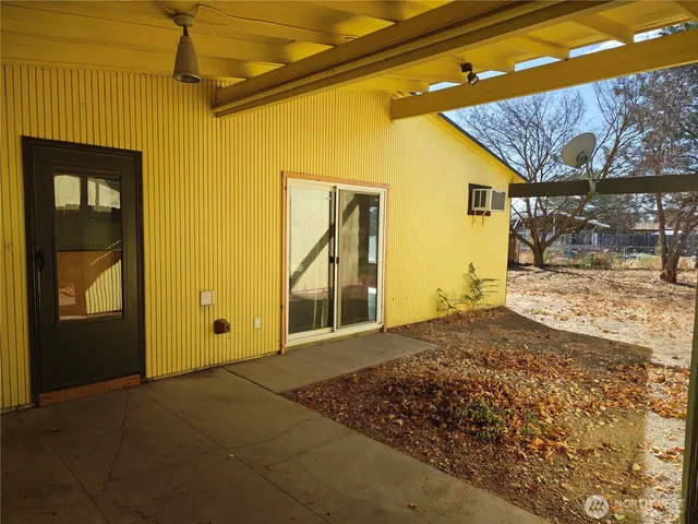 a view of a house with a snow on the wall
