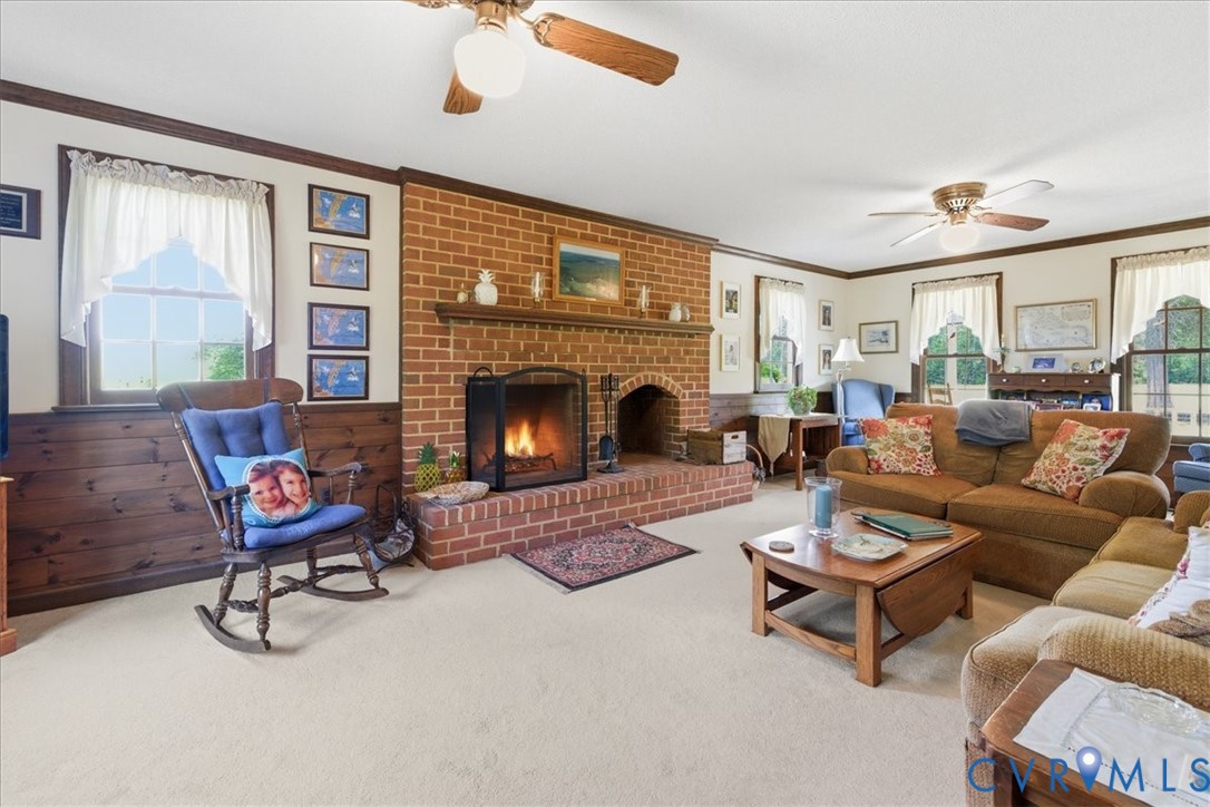 15414 Sunnybrook Road Petersburg, VA 23805 - Photo 14 of 29 a living room with furniture and a fireplace