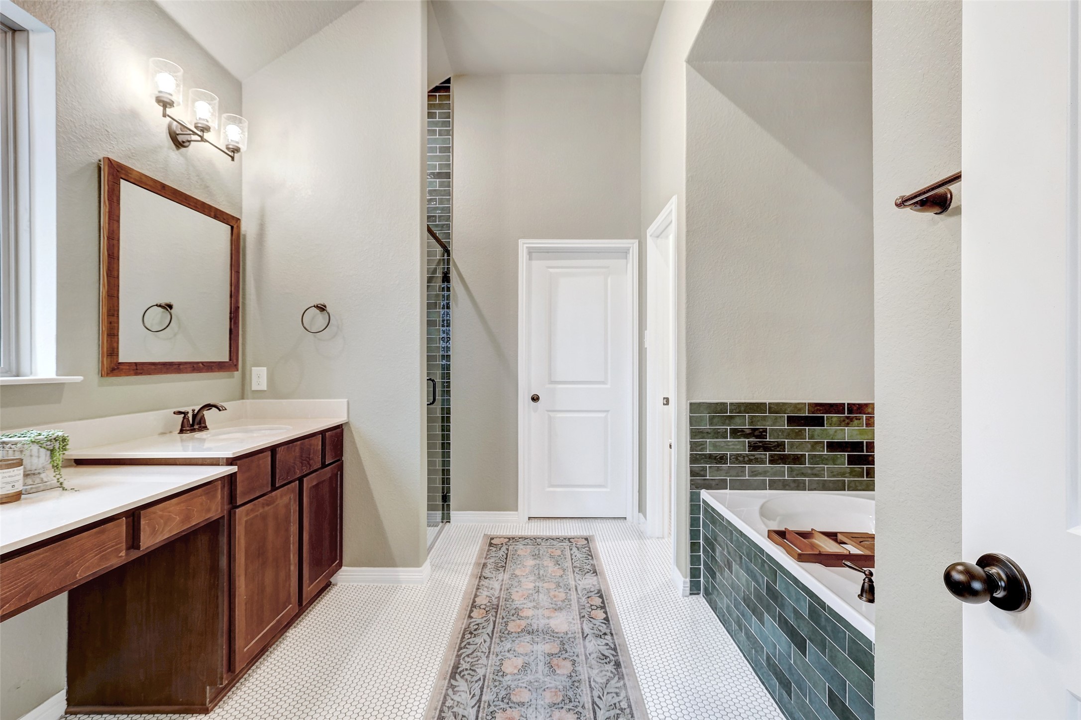 1117 Spring Gulch Lane Georgetown, TX 78628 - Photo 24 of 39 Dual vanities and a deep soaking tub create a personal spa retreat.