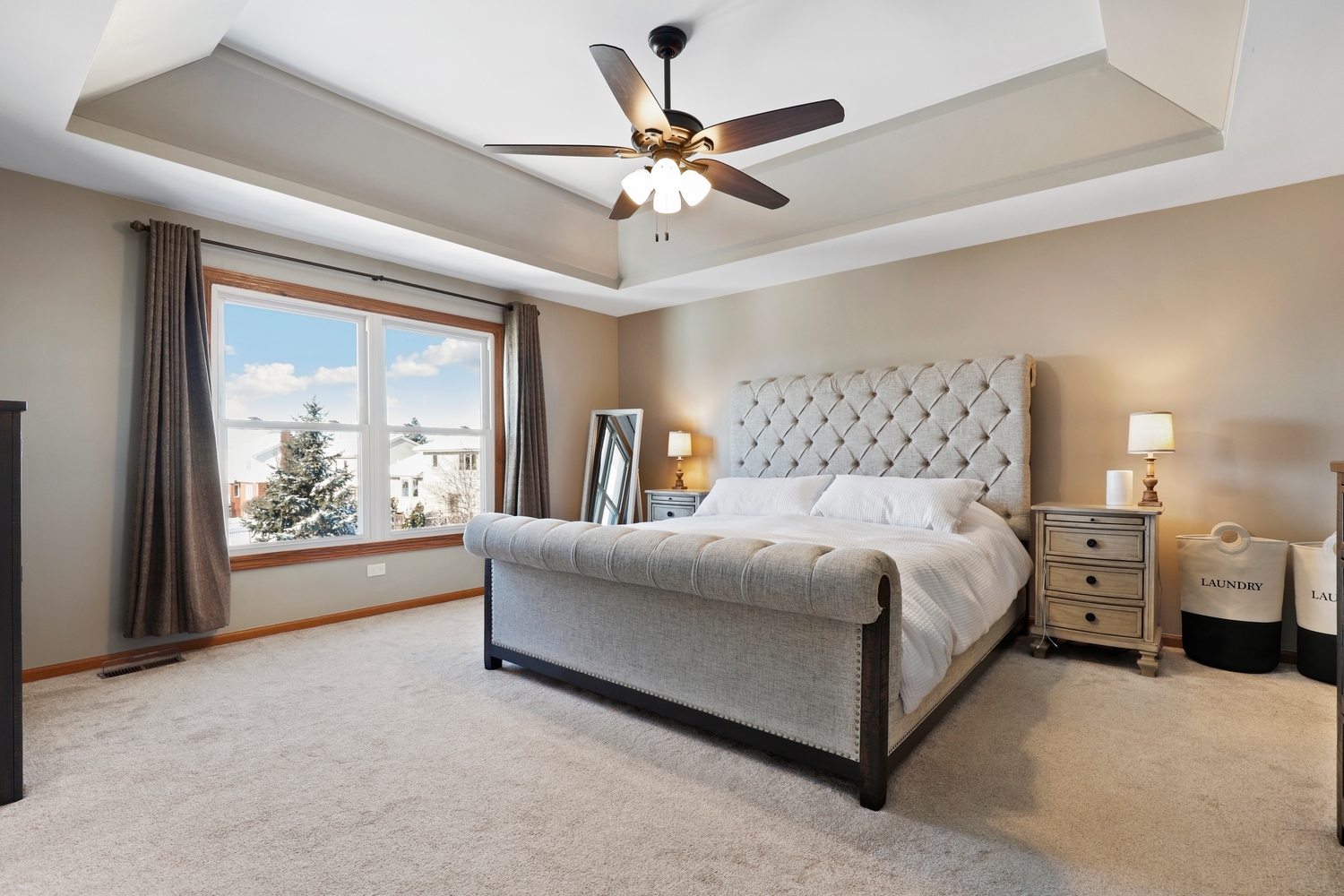 14710 Heathcliff Road Homer Glen, IL 60491 - Photo 13 of 27 a bedroom with a large bed and a large window