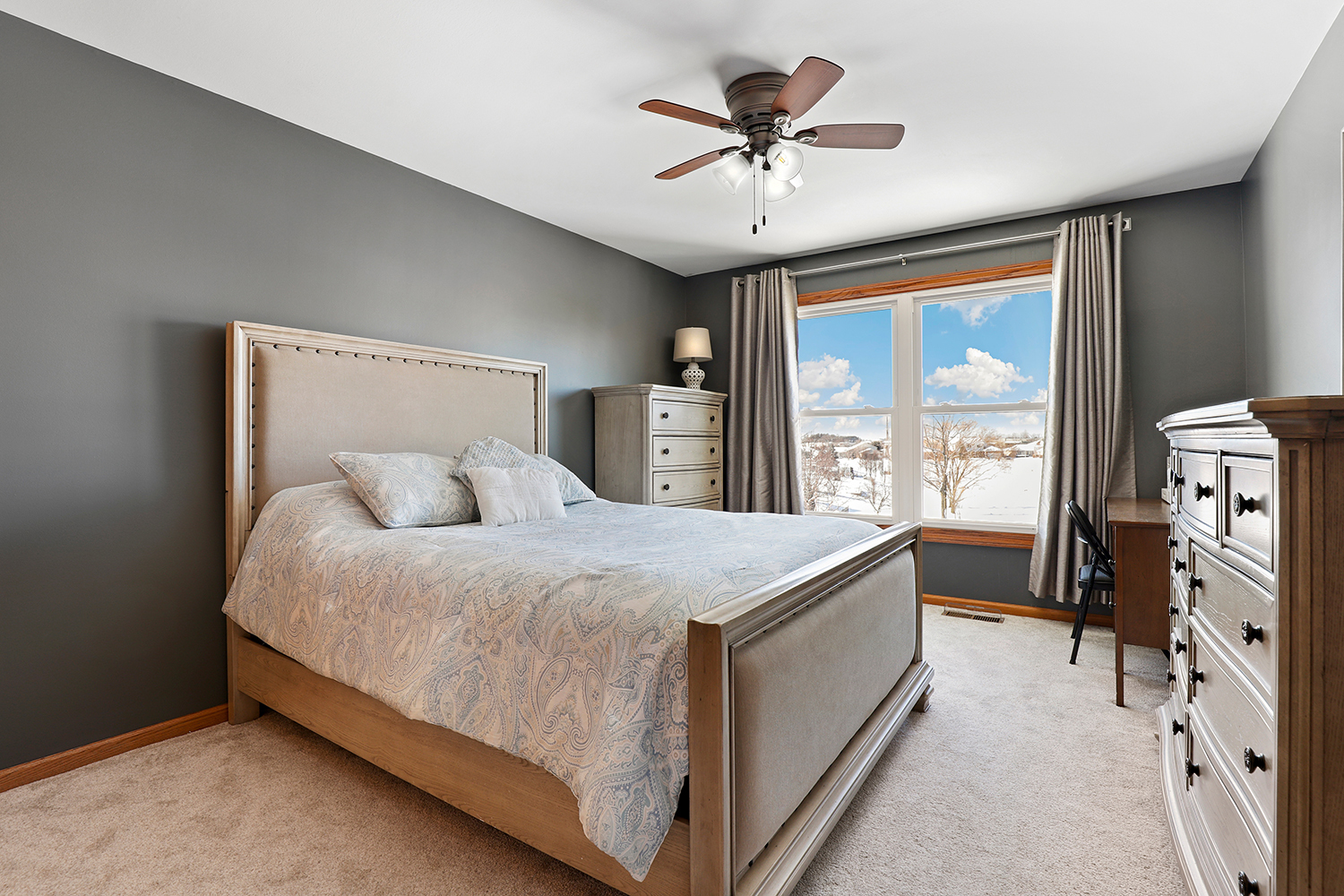 14710 Heathcliff Road Homer Glen, IL 60491 - Photo 15 of 27 a spacious bedroom with a large bed and a chandelier