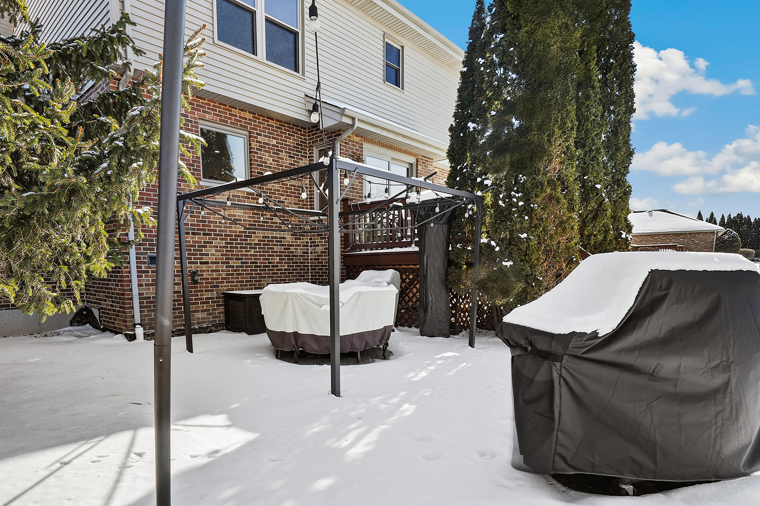 14710 Heathcliff Road Homer Glen, IL 60491 - Photo 24 of 27 a view of a patio with a table and chairs